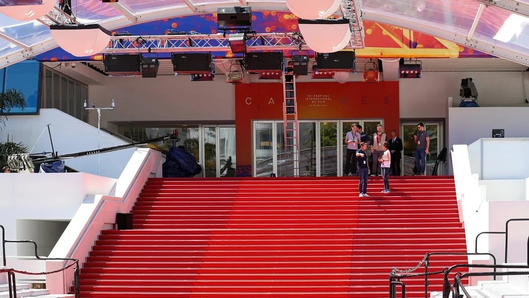 Red carpet entrance at Cannes Film Festival venue, part of the Nice to Cannes guided tour.