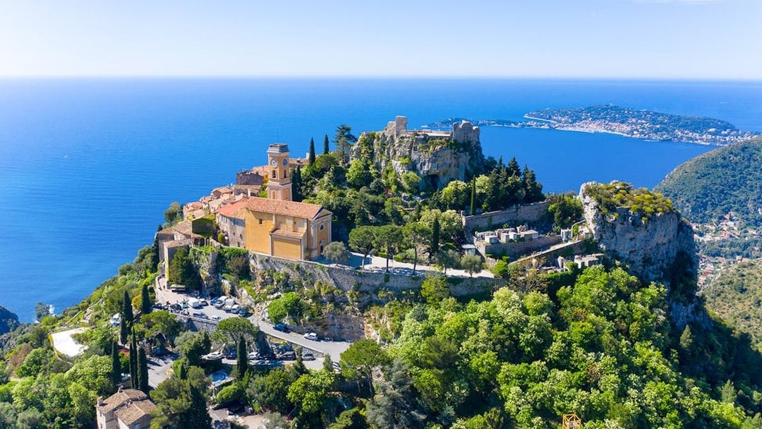 Aerial view of Èze village with Mediterranean Sea in the background.