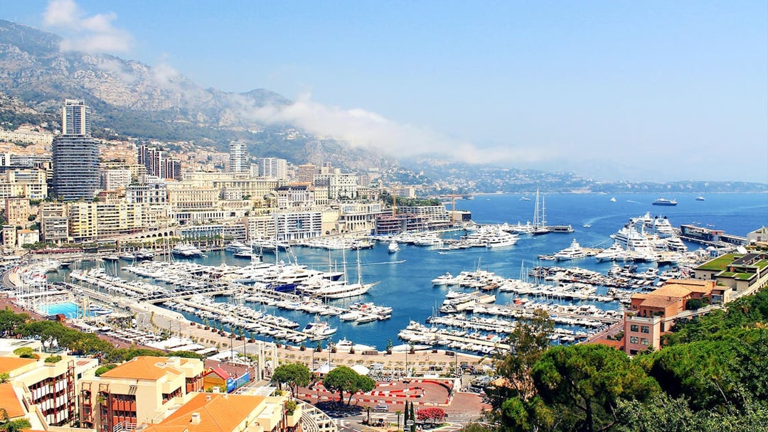 Monaco harbor view with yachts and cityscape, part of the Monaco day tour from Nice.
