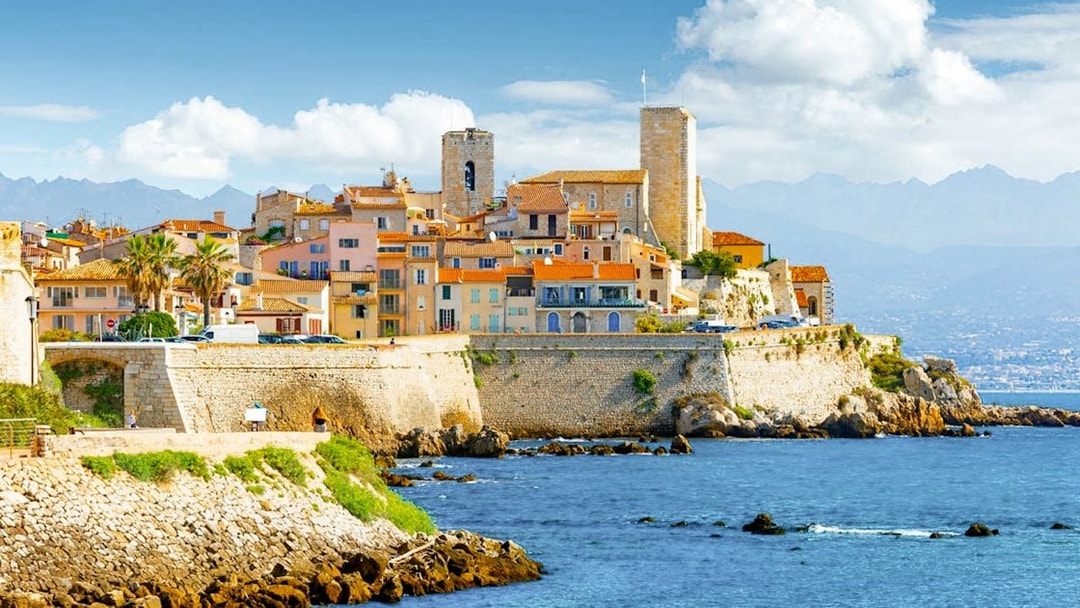 Antibes town with historic buildings and sea view, France.