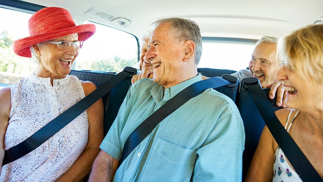 Group enjoying a car ride on the St Tropez and Port Grimaud day tour from Nice.
