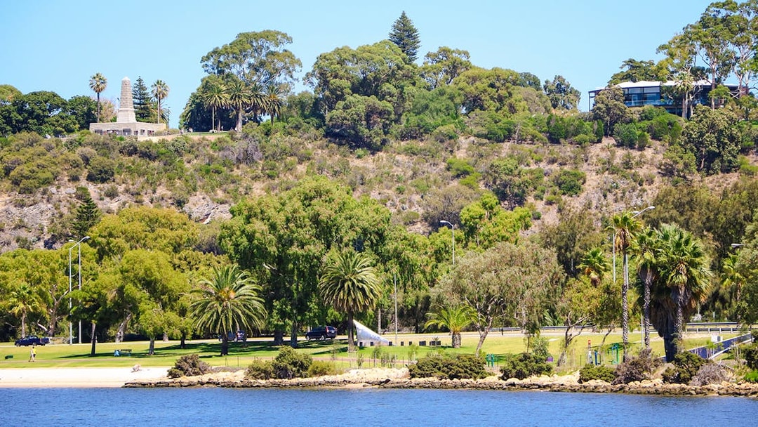 Kings Park landscape with lush greenery and war memorial in Perth, Australia.