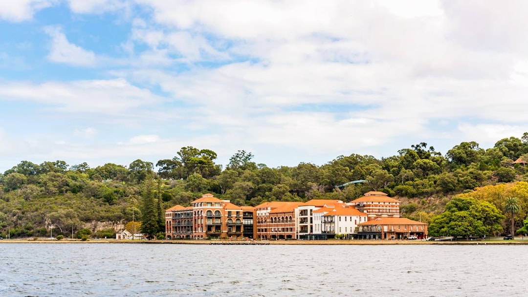 Swan Brewery on Swan River with surrounding greenery in Perth, Australia.