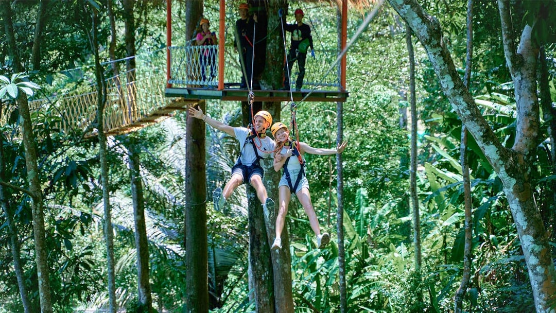 Ziplining through lush forest at Erawan Patong Seaview, Phuket.