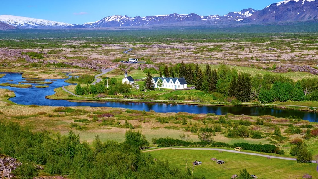 Thingvellir National Park landscape with river and distant mountains, Reykjavik Golden Circle tour.