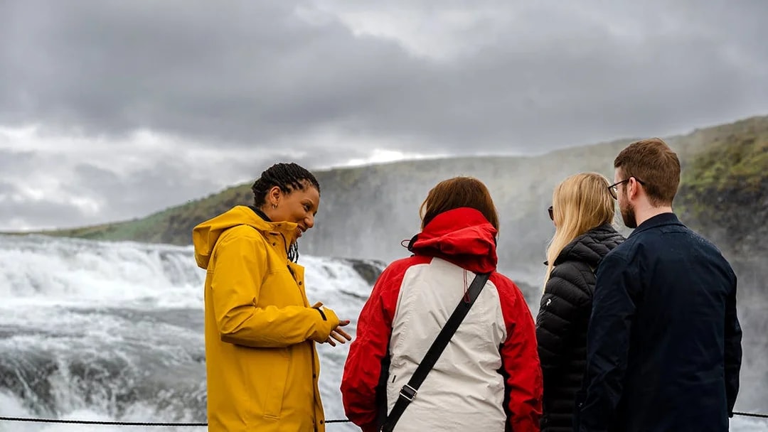 Tour group at Gullfoss waterfall on Golden Circle tour from Reykjavik.