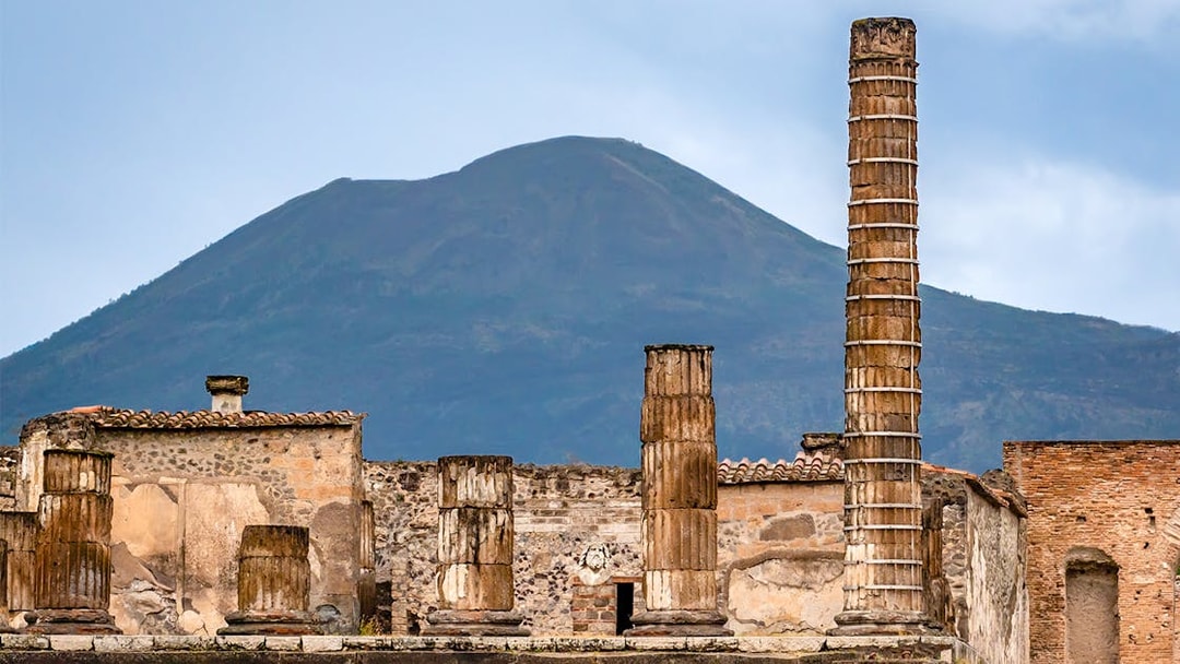 Ancient ruins of Pompeii with Mount Vesuvius in the background, Naples, Italy.
