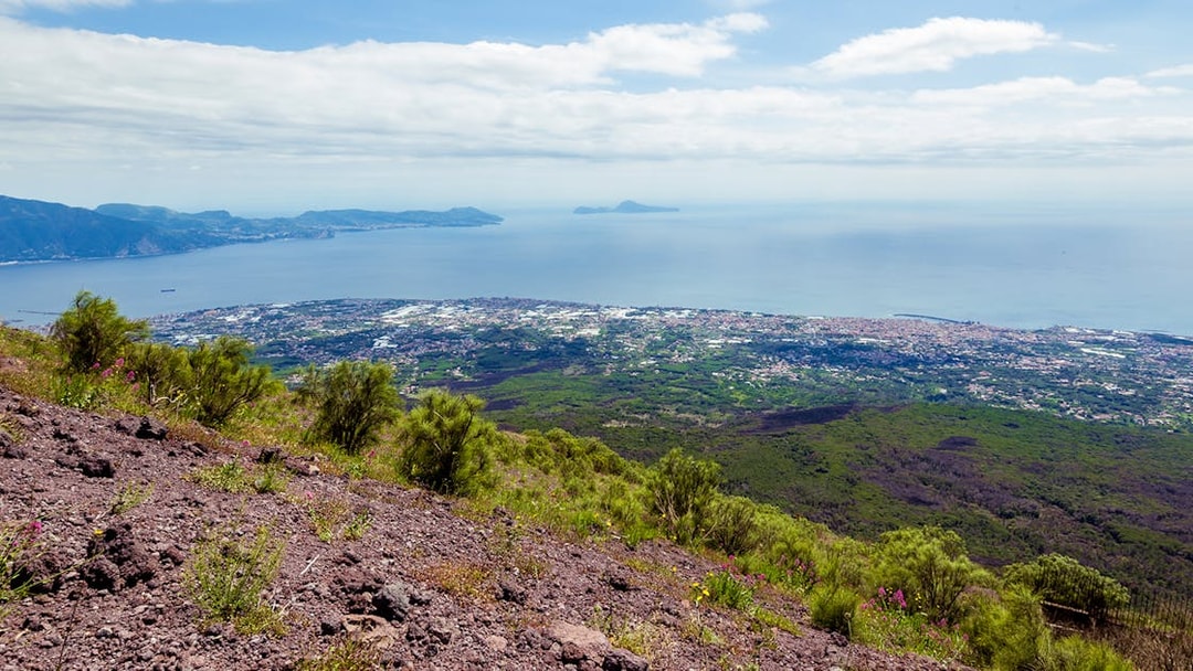 View from Vesuvius volcano overlooking the Bay of Naples and surrounding landscape.