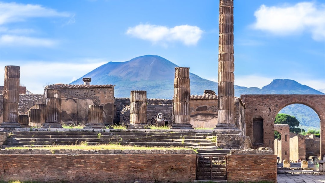 Ancient ruins of Pompeii with Mount Vesuvius in the background, UNESCO World Heritage Site.