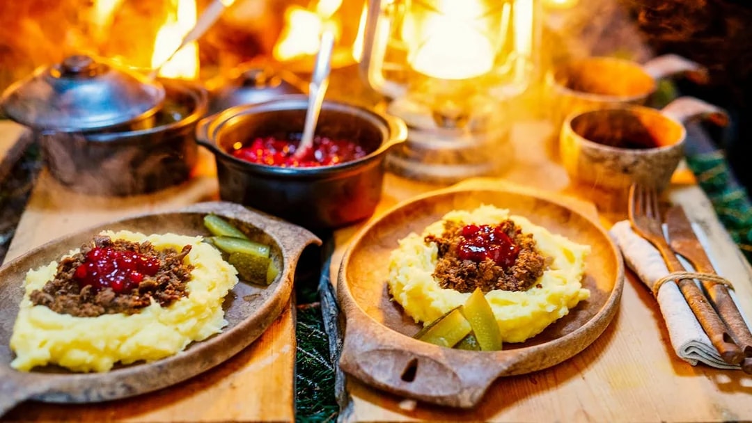 Traditional Finnish meal with mashed potatoes and lingonberry sauce at Santa Claus Village, Rovaniemi.