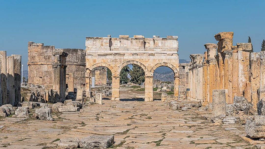 Ancient stone archway and ruins in Hierapolis, Pamukkale, Turkey.