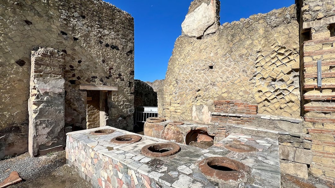 Ancient kitchen ruins with stone oven at Herculaneum, Italy.