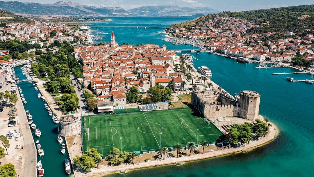 Aerial view of Trogir's historic center and waterfront near Split, Croatia.