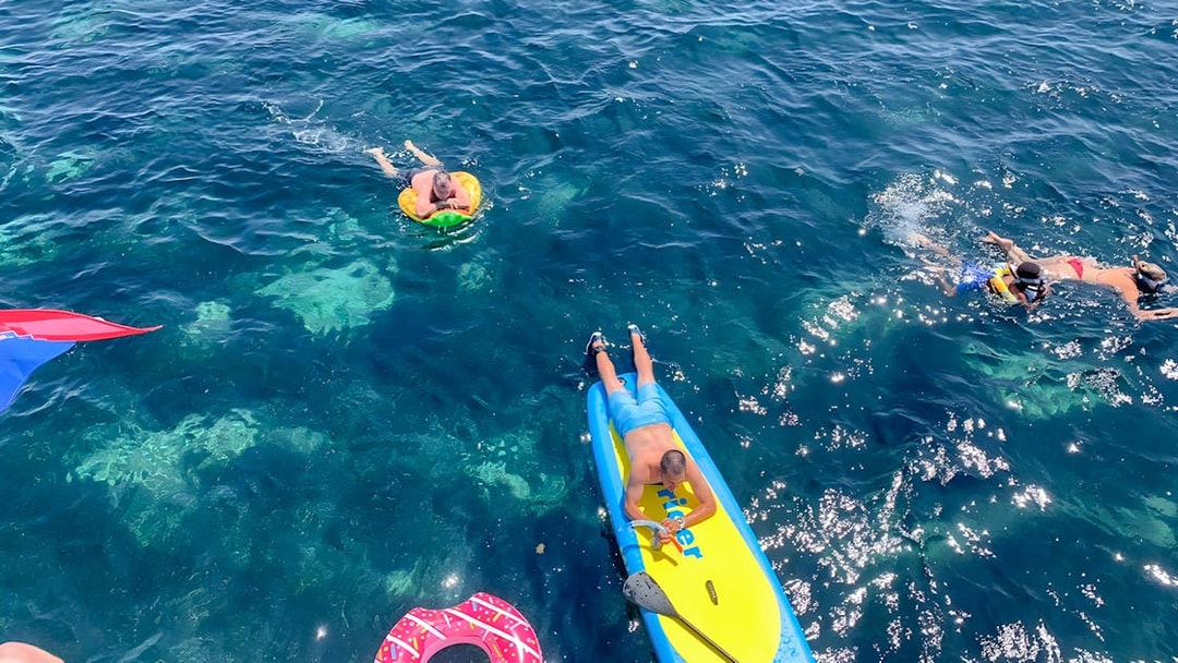 People enjoying water activities near Split, Croatia, during a Hvar and islands cruise.