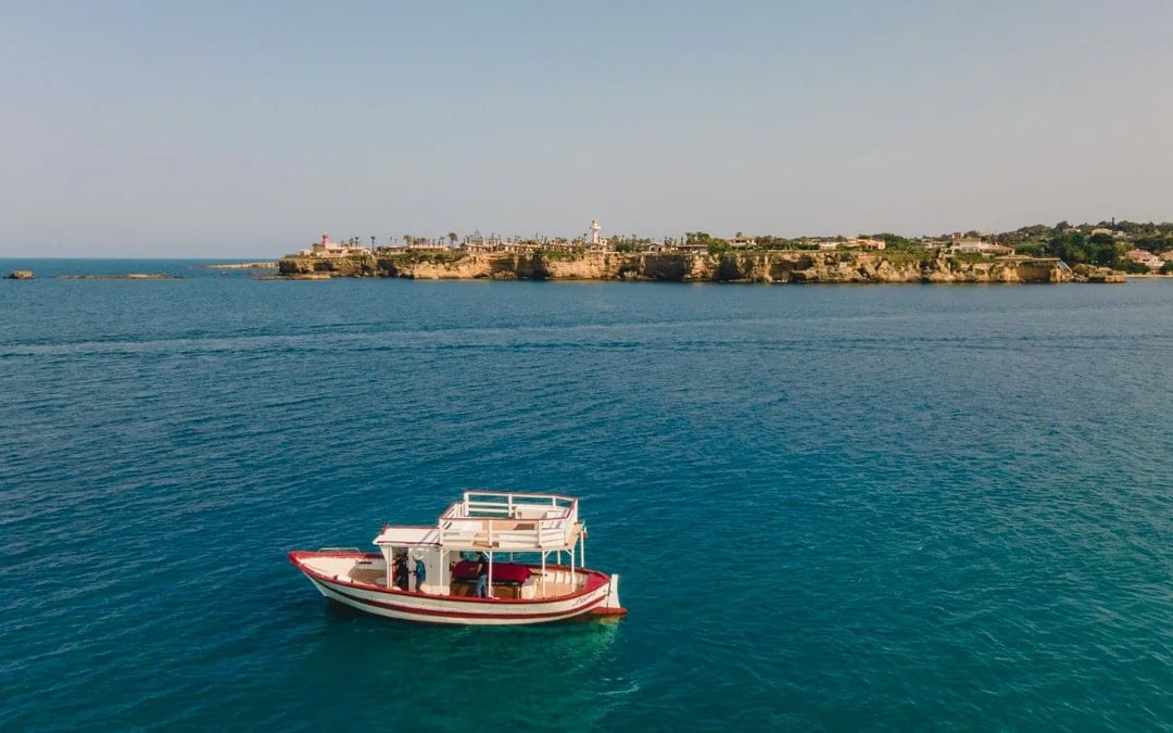 From Syracuse: Ortigia Island an Sea Caves Boat Tour
