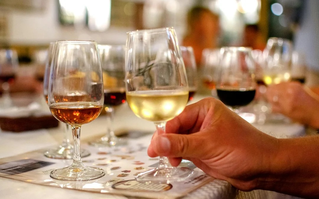 Wine glasses on a table during Niagara Falls evening tour tasting event.