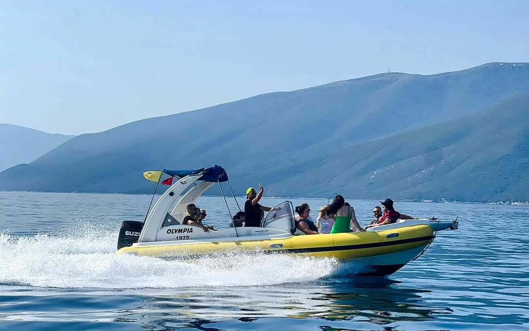 From Vlore: Unknown Escape Party Boat Cruise with Drinks, Music & Secret Swim Stops Image 3