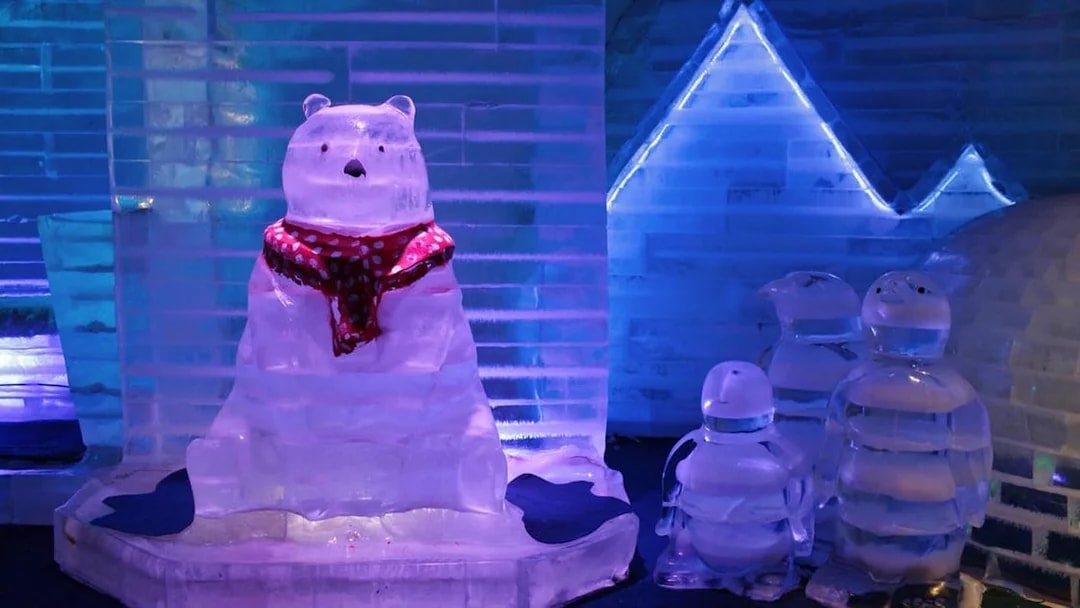 Ice sculptures of a bear and penguins at Frost Magical Ice of Siam.