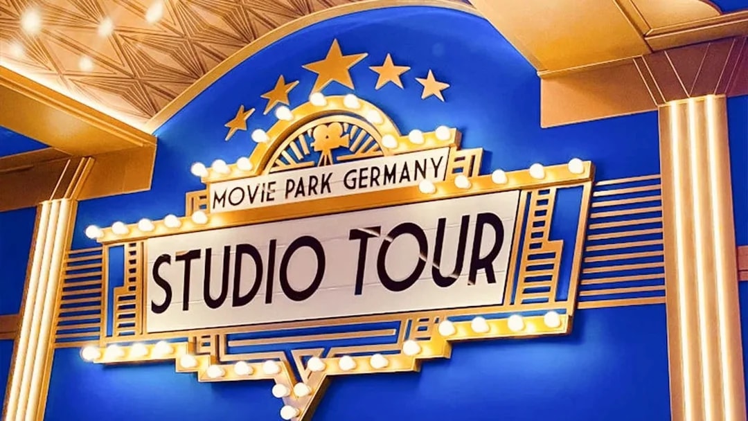 Movie Park Germany Studio Tour sign with lights and stars.