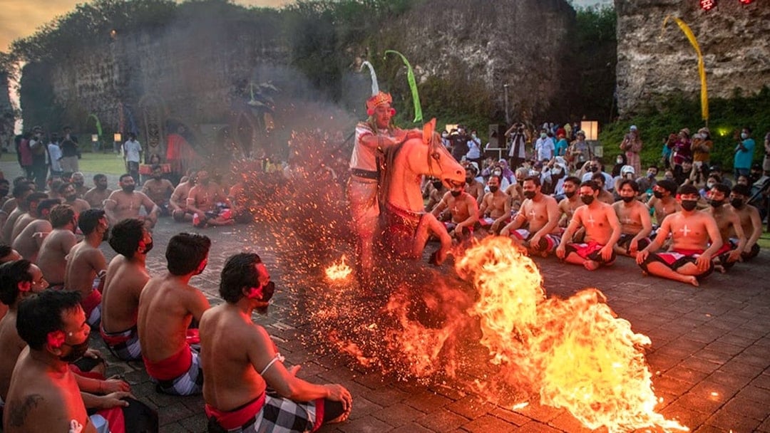 Kecak dance performance with fire at Garuda Wisnu Kencana, Bali.