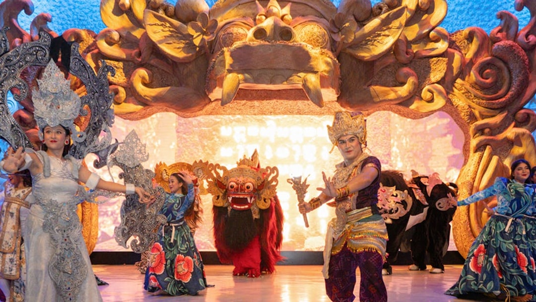 Balinese dancers performing at Garuda Wisnu Kencana at night.