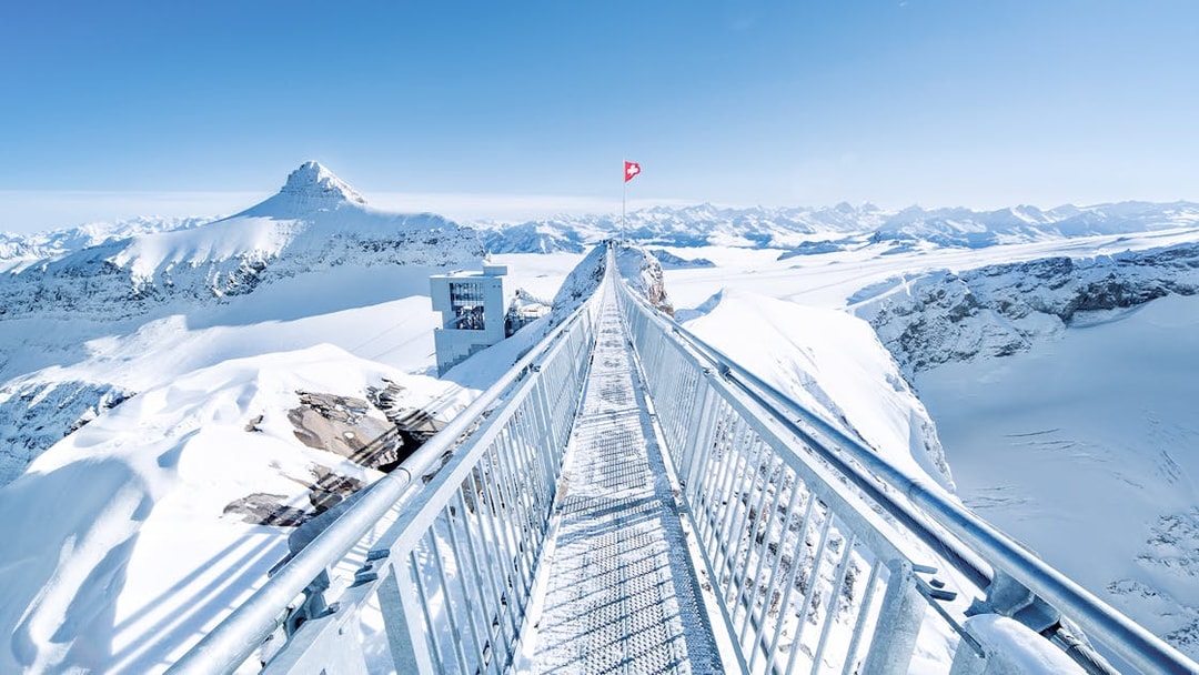 Glacier 3000 suspension bridge with snowy Alps in Montreux, Switzerland.
