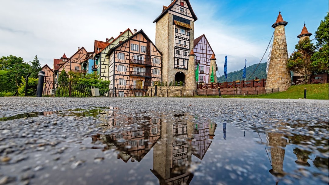 Colmar Tropicale medieval village with half-timbered buildings and stone towers, Malaysia.