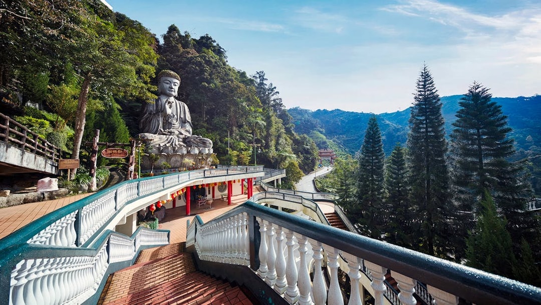 Genting Highlands Buddha statue and scenic view near Kuala Lumpur.