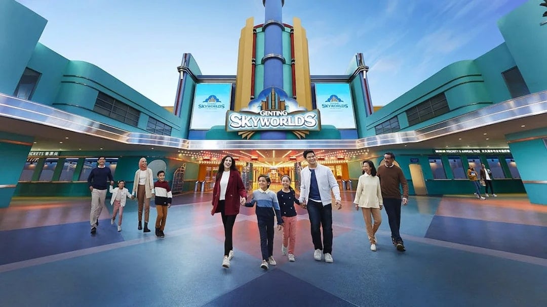 Visitors walking at the entrance of Genting SkyWorlds theme park.