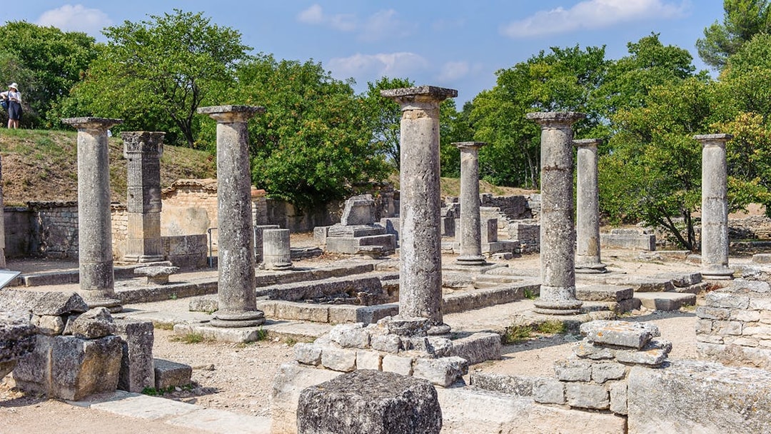 Ancient stone columns at Glanum Archaeological Site in Saint-Rémy-de-Provence, France.