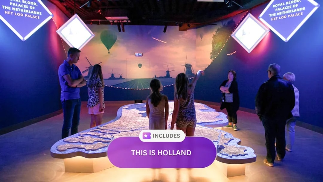 Visitors exploring interactive map at This Is Holland in Amsterdam.
