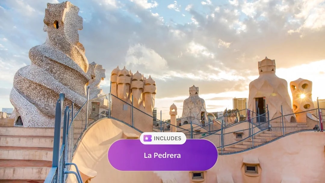 Rooftop chimneys of La Pedrera, Casa Mila in Barcelona at sunset.