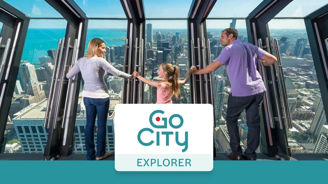 Family enjoying Chicago skyline view from observation deck.