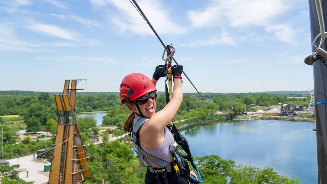 Ziplining over a scenic lake in Chicago with a city pass.