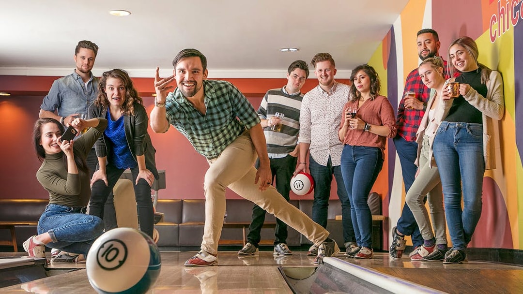 Group enjoying a bowling game in Chicago.