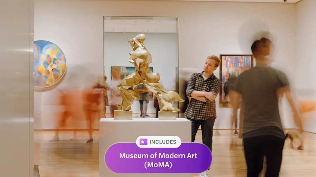 Sculpture display at Museum of Modern Art, New York, with visitors observing.