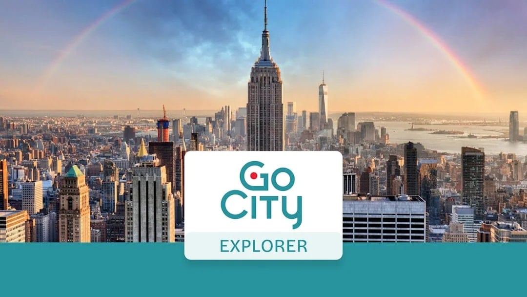 New York City skyline with Empire State Building and rainbow, promoting Go City Explorer Pass.