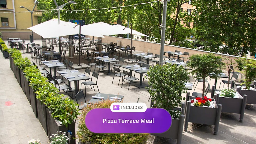 Outdoor terrace dining area with tables set for a pizza meal, Go City Rome Explorer pass.