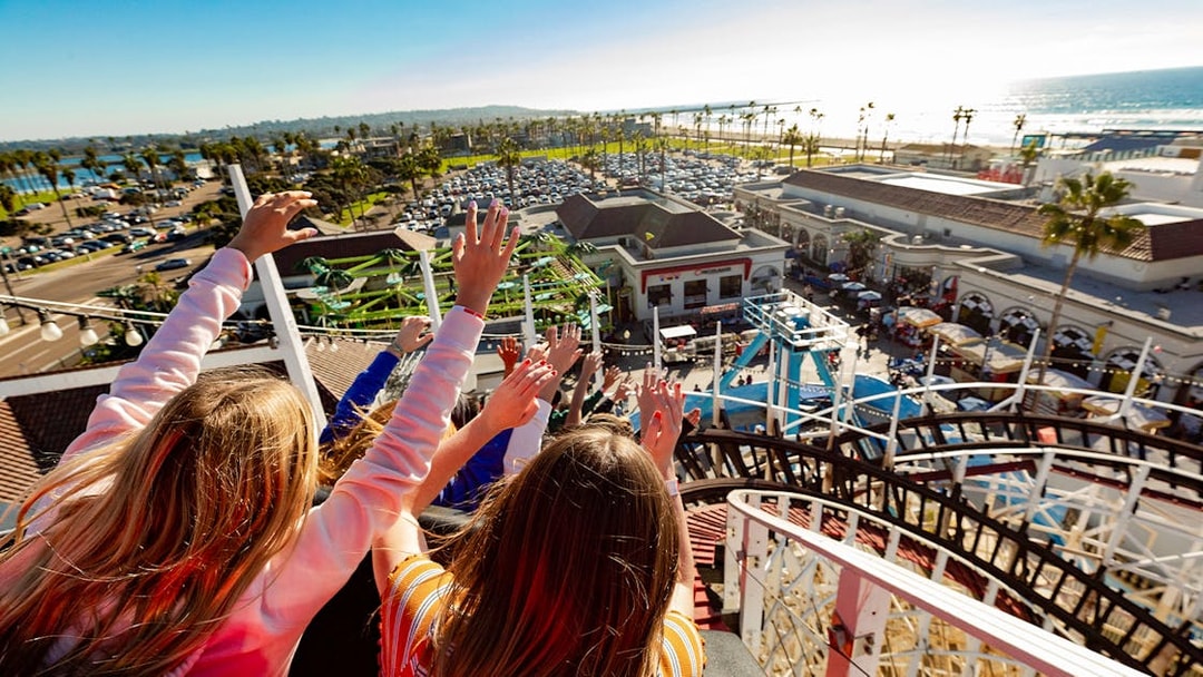 Roller coaster ride at Belmont Park, San Diego, overlooking the ocean and amusement area.