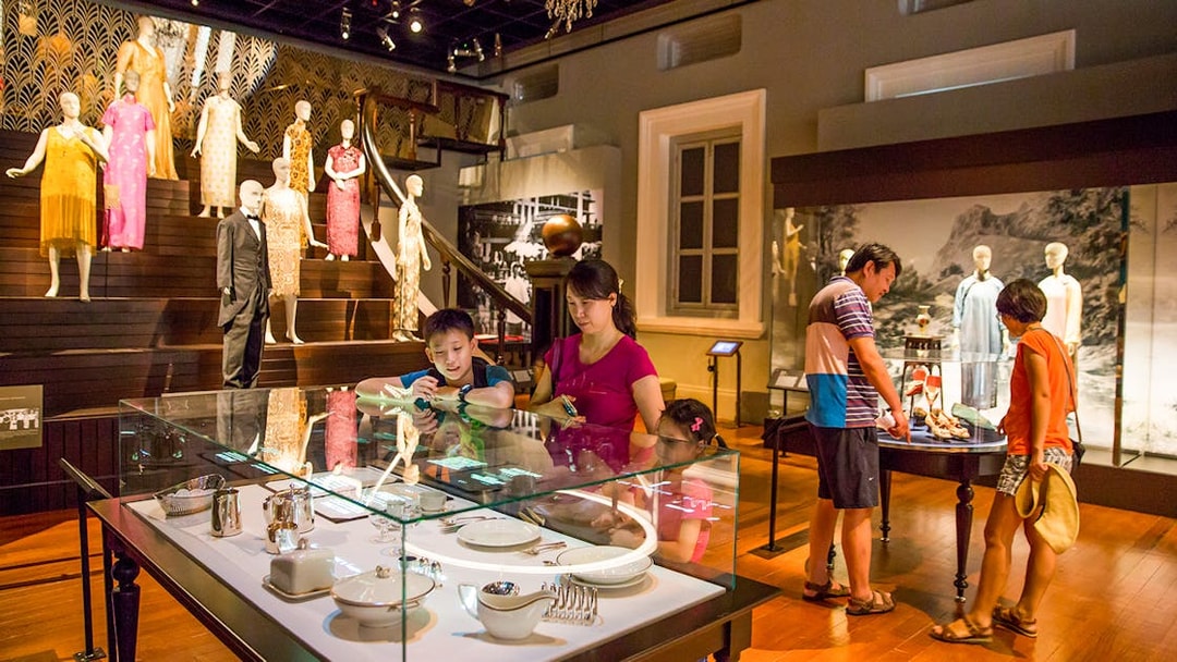 Visitors exploring exhibits at the Asian Civilisations Museum in Singapore.