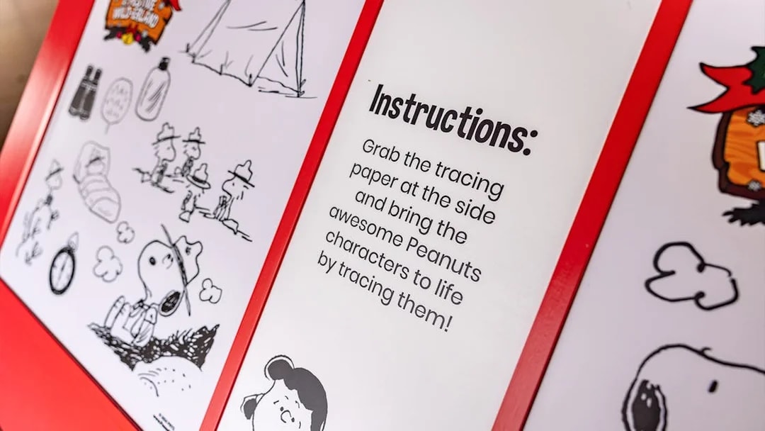 Instructions for tracing Peanuts characters at Singapore Zoo exhibit.
