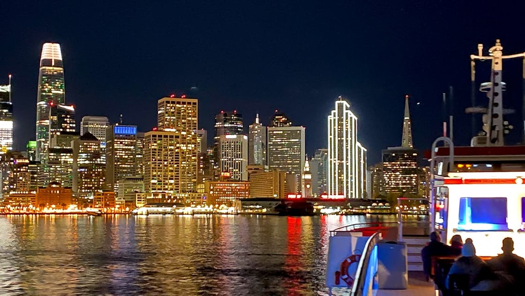 San Francisco skyline at night viewed from a Bay Cruise, USA.