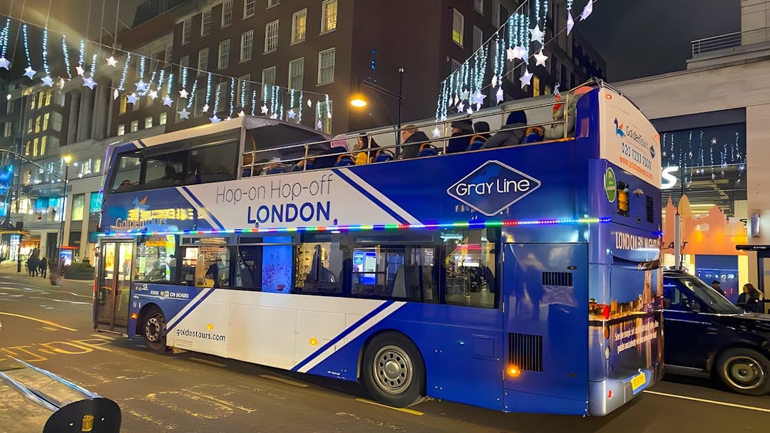 Open-top bus on London Christmas Lights Night Tour by Golden Tours.