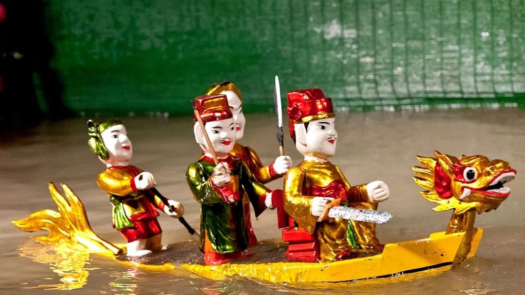 Water puppets on a dragon boat at Golden Water Puppet Show, Vietnam.