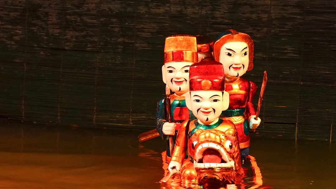 Water puppets performing at Golden Water Puppet Show in Vietnam.