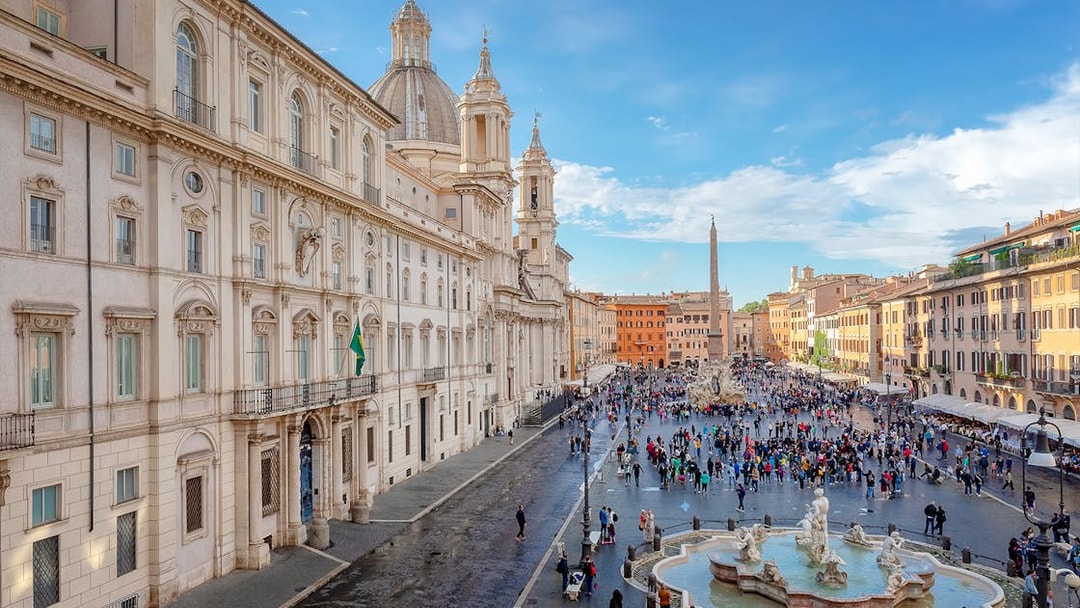 Piazza Navona in Rome with Fountain of the Four Rivers and surrounding architecture.