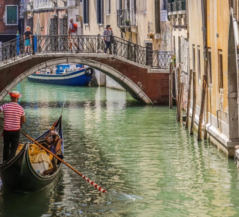 Venice: Crafted Gondola Under Breathtaking Bridge of Sighs™