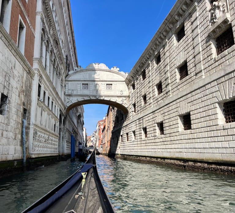 Venice: Crafted Gondola Under Breathtaking Bridge of Sighs™