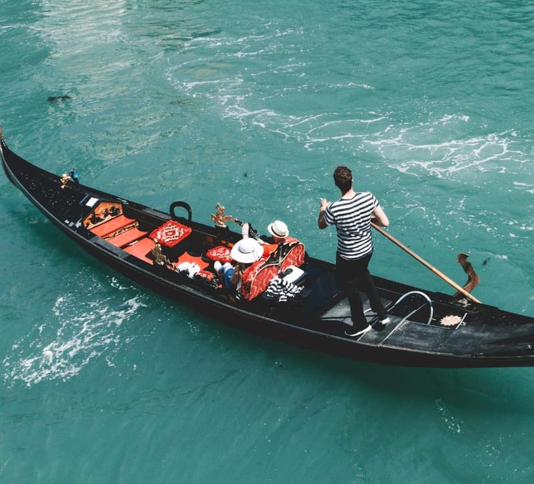 Venice: Crafted Gondola Under Breathtaking Bridge of Sighs™