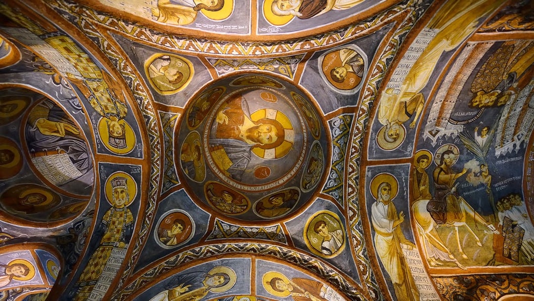 Frescoes on the ceiling of a church in Göreme Open-Air Museum, Cappadocia, depicting religious figures.